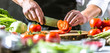 canvas print picture - Chefkoch in der Küche mit Frischem Gemüse(Tomaten)