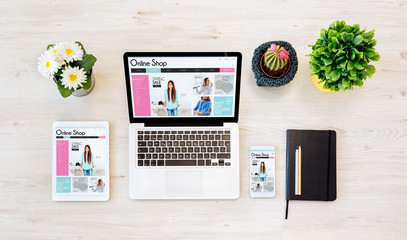 top view devices with online shop web site on screen
