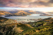 Lyttelton harbor and Christchurch at sunset, New Zealand