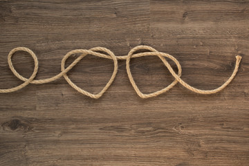 Two heart ropes connected to a knot