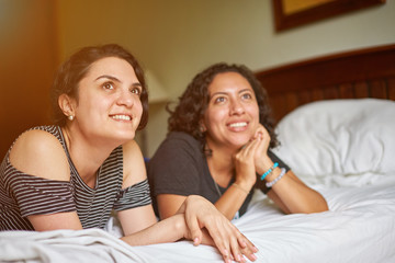 Wall Mural - Two girl friends on bed