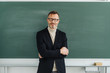 © contrastwerkstatt - Confident middle-aged male teacher or professor