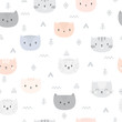 Tribal seamless pattern with cartoon cats. Abstract geometric art print. Hand drawn ethnic background with cute animals