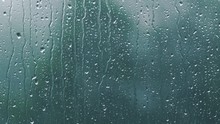 Real Rain Drops Sliding On Window Glass