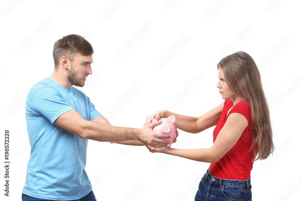 Couple with piggy bank on white background. Money problems in relationship