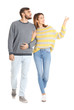 © Africa Studio - Young couple in casual clothes walking on white background