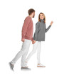 © Africa Studio - Young couple in casual clothes walking on white background