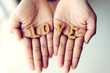 © vizaphoto - Cookies are letters that are arranged in love. The word love is in the hand. Valentine day