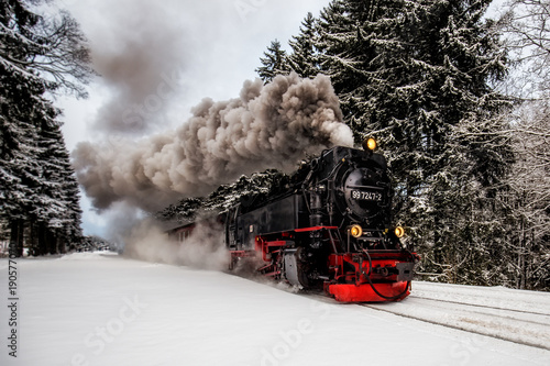 Steam train on the way to Brocken through winter landscape © rphfoto