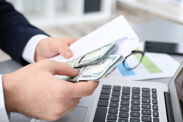 Poster - Businessman with bribe at table, closeup