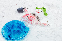 Snowman With A Red Nose Stands In The Park In The Snow. Winter Fun And Games In The Fresh Air. Funny Snowman
