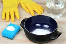 Natural Cleaners For Burnt Meal In Pot. Baking Soda (sodium Bicarbonate), Water,  Sponge 