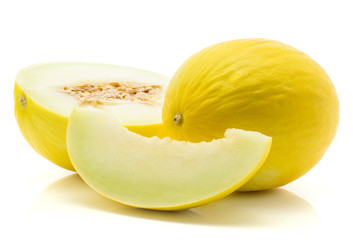 Canvas Print - Yellow honeydew melon, one half with seeds, one slice seedless, isolated on white background.