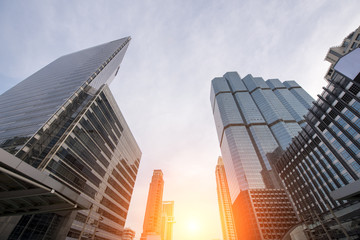 buildings skyline looking up with blue sky. Business downtown and skyscrapers high-rise buildings modern architecture