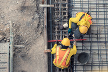 Aerial View Of Construction Worker In Construction Site