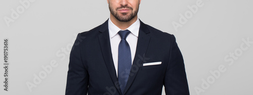 Fotografía Young businessman banner on grey background