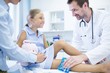 © Science RF - Doctor putting ice pack on girl's leg