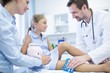 © Science RF - Doctor putting ice pack on girl's leg