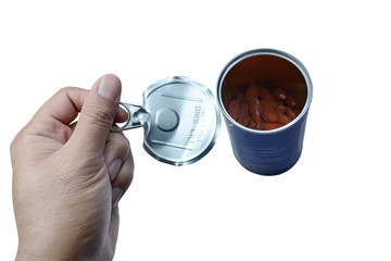 adult hands holding the metal lid to open the almond cans on white background isolated