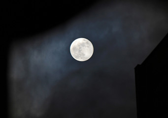 the bright moon among night clouds