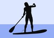 Silhouette of a female standup paddler