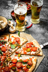 Canvas Print - Mexican pizza with cold beer.