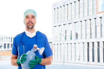 Wall Mural - young anesthetist with resuscitation bag