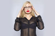 © yevgeniya131988 - Beautiful sexy pretty girl wear black suit blouse and pants lady boss business woman skin tan long blonde hair party style fashion clothes, glasses accessories, studio grey background.