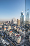 Fototapeta Nowy Jork - View of skyscrapers in Dubai Downtown district on a sunny day. Dubai, UAE.