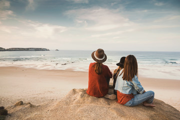 Girs enjoying  a day on the beach