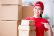 © Elnur - Young woman working in parcel distribution center