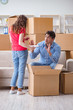 © Elnur - Young pair moving in to new house with boxes