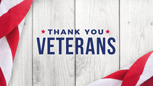Thank You Veterans Text With American Flag Over White Wood Background For Memorial Day And Veteran's Day Holidays
