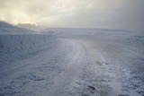 Fototapeta Miasto - New plowed winter road.