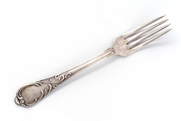 old fork on white background