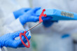© vmargineanu - Dentist holding dentistry tool. Dentist with dentistry tools in clinic. Selective focus on tools.
