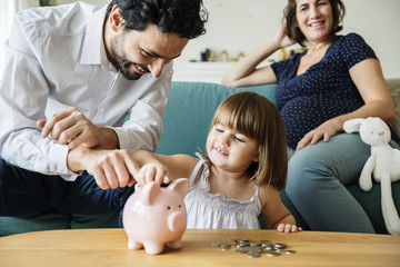 Poster - Family saving money in piggy bank