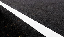 White Solid Line. Road Markings On Asphalt On The Street.