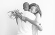 © Rawpixel.com - African descent couple hugging each other