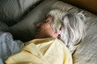 © Rawpixel.com - Senior woman sleeping on the bed
