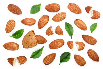 almonds with leaves isolated on white background. Top view. Flat lay pattern