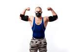 Fototapeta Przeznaczenie - Young sporty man in blue tights, black training mask and black elbow pose and shows biceps on white isolated background