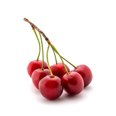 Wall Mural - Photo of red cherries with tails isolated on white background