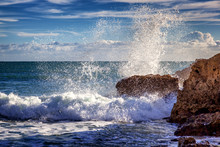 Beautiful Rocky Coast Of The Ocean, Stunning Beautiful Landscape Of The Algarve, Portugal, Waves Crash Against The Shore In Splashes, Travel To Europe