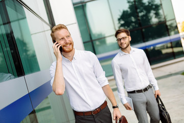 Sticker - Business colleagues in shirt walking outdoors