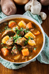 Wall Mural - Irish stew made with beef, potatoes, carrots and herbs