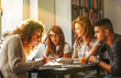 © BalanceFormCreative - Group of  students study in the school library.Learning and preparing for university exam.