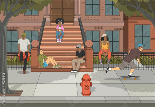 Group of young people in front of brownstone building. Teenagers.