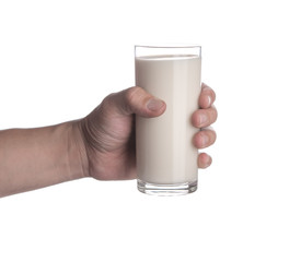 Sticker - Hand holding glass of milk isolated on white background