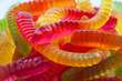 Gummy worm candy making a background